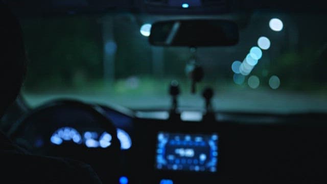 Night Drive Through Illuminated City Streets