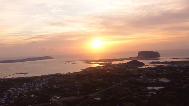 Sunset over a coastal landscape