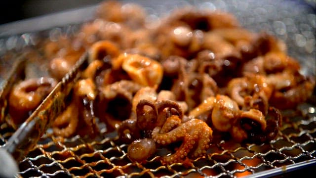 Grilled webfoot octopus grilled on the grill