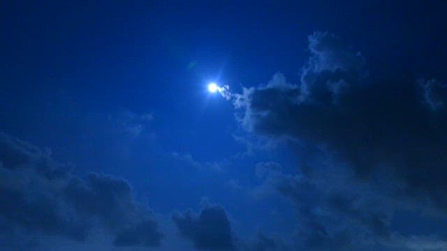 Moonlit Sky Over Tranquil Sea