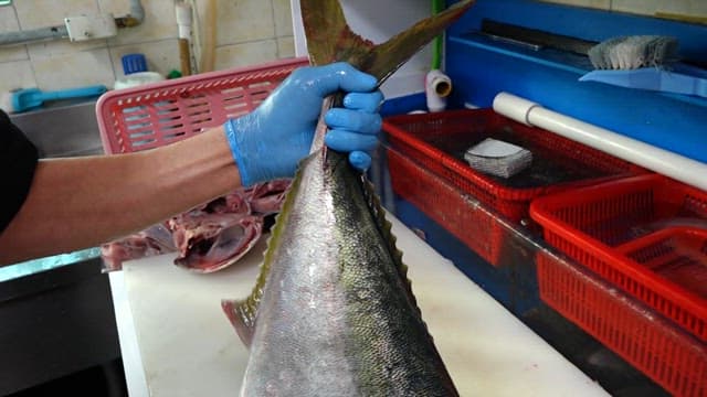 Yellow tail on the chopping board