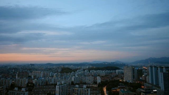 Time-lapse of a Cityscape at Twilight