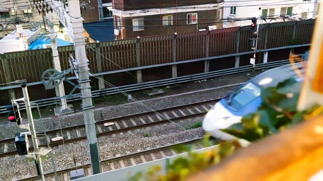 High-speed train passing through residential area