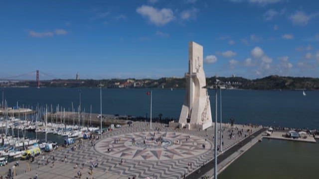 Tourists Gathering at a Riverside Padrao dos Descobrimentos in Lisbon