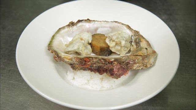 Sauce poured over fried tropical oyster