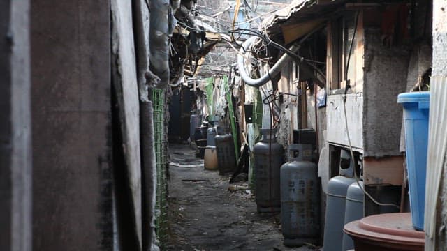 Weathered Alley in a Dense Residential Area in the City Center