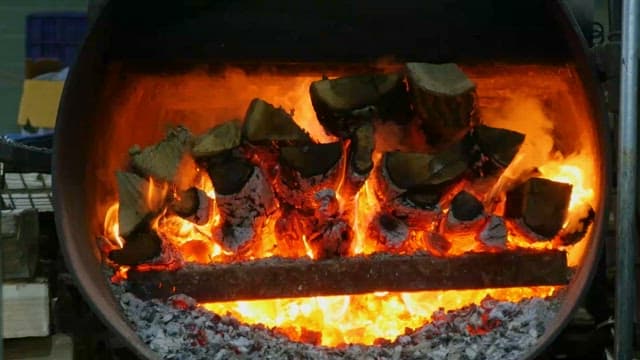 Close-up of flaming wood in a furnace