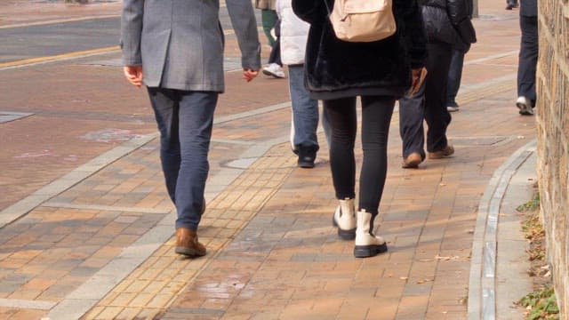 People walking on the street in midwinter