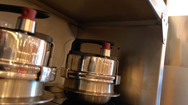 Multiple pressure cookers in a modern kitchen