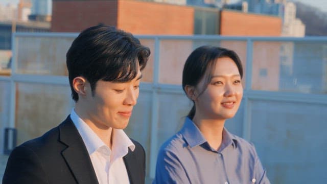 Two people having a conversation outdoors