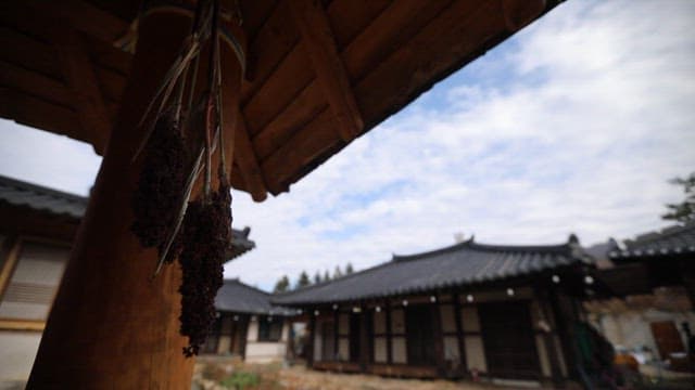 Traditional Korean house under a cloudy sky