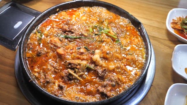 Gopchangjeongol Boiling in a Pot on a Restaurant Table