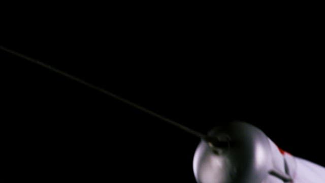 Arm of an Attacking Fencer