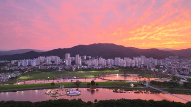 Vibrant Sunset Over a Peaceful Cityscape