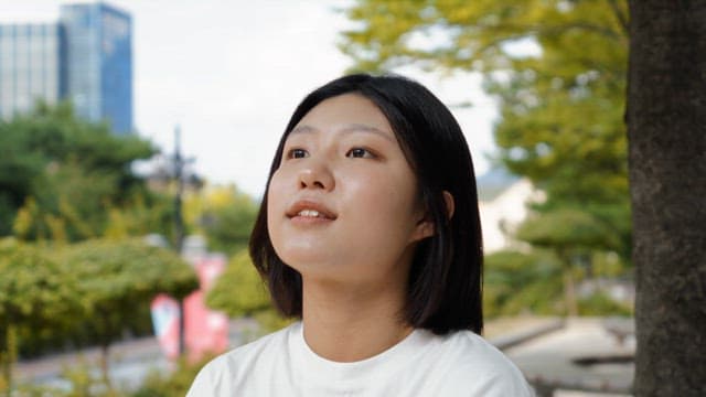 Woman enjoying a moment outdoors