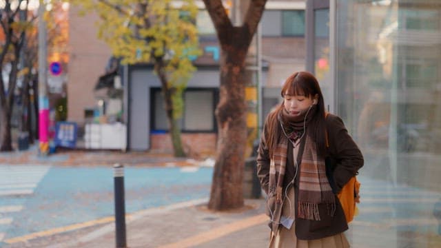 Students waiting for the bus in winter