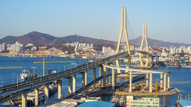Busy Busanhangdaegyo Bridge from day to night