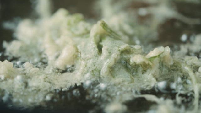 Green Vegetables Fried in Hot Oil