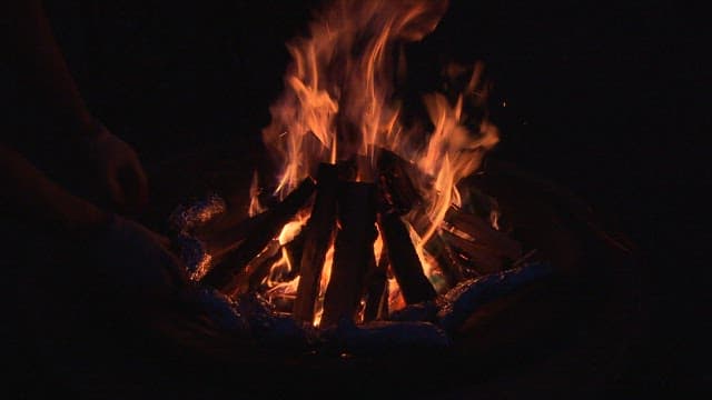 Campfire burning brightly all night long
