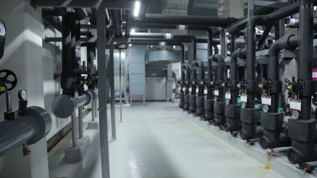 Rows of pipe machinery in an industrial facility