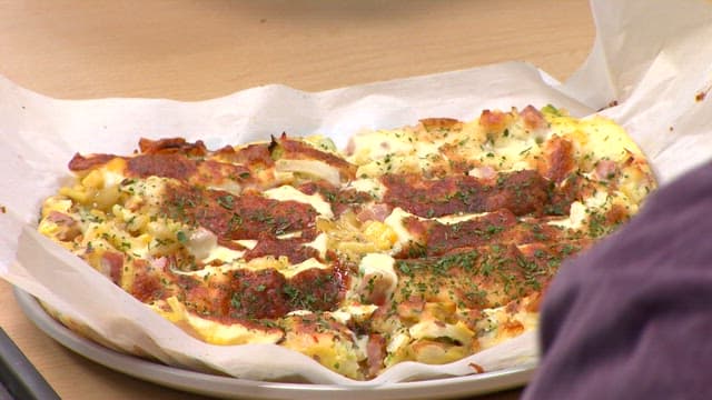 Freshly baked sweet potato pizza on a table