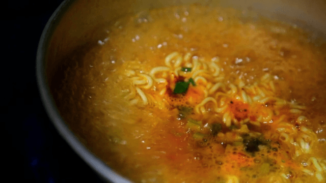 Ramyeon boiling in a pot
