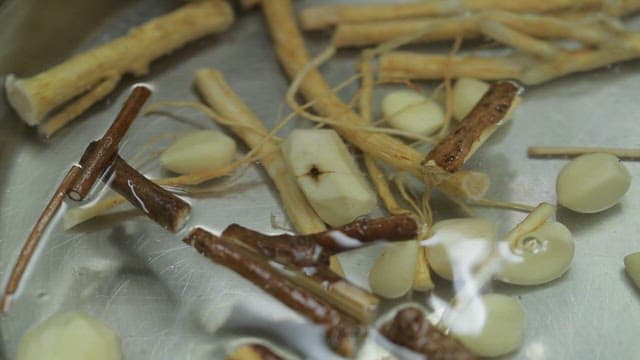 Various herbs and ingredients soaking in water