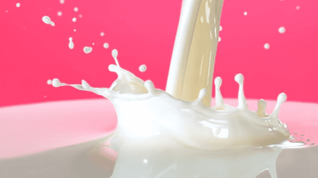 Milk pouring and splashing