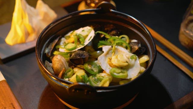 Gourmet Clam Stew with Fresh Mugwort