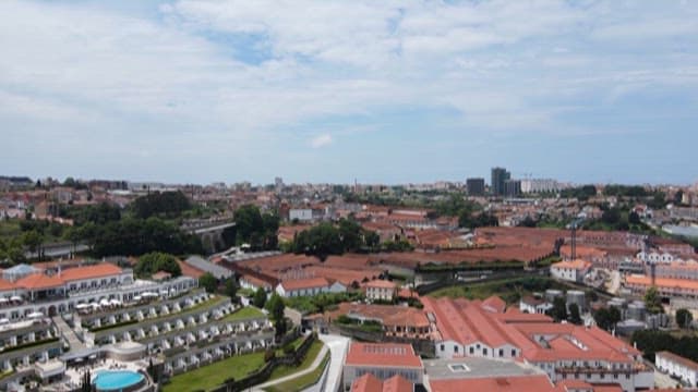 City with Red-roofed Buildings on a Sunny Day