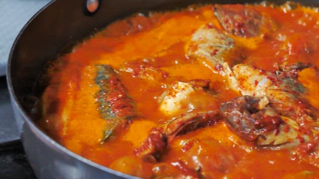 Red and Spicy Mackerel Stew Boiling in a Pot