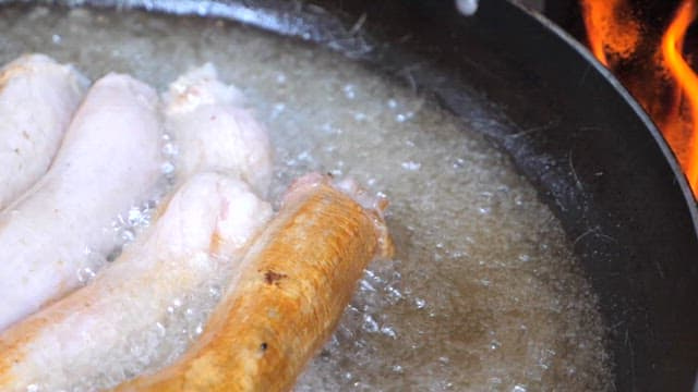 Tripe fried sizzling in hot oil