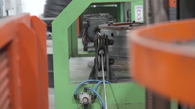 Industrial machine processing metal wire