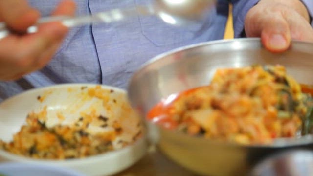 Fried rice soaked in pork backbone stew soup