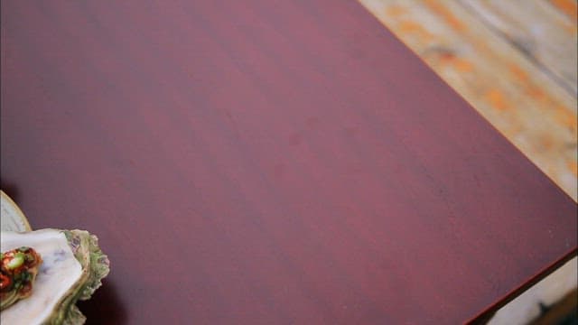 Oysters with spicy sauce on a plate on a table