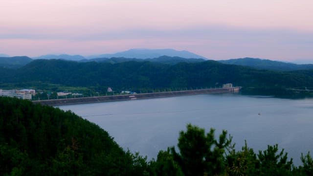 Tranquil lake surrounded by mountains