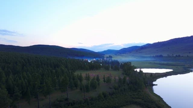 Serene village surrounded by forests