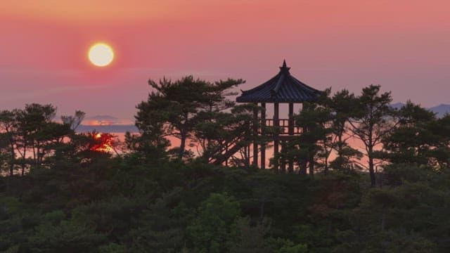 Sunset view with an old pavilion