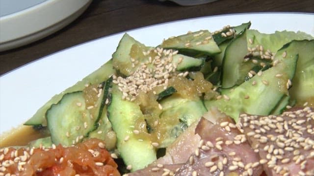Appetizingly plated pig's feet and cucumbers
