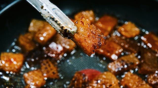 Pork Rind Sizzling in a Pan