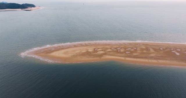 Sandbank Exposed in the Middle of the Sea