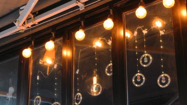 Street lights hanging on a building