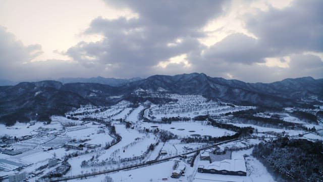 Snow-covered Valley at Dusk