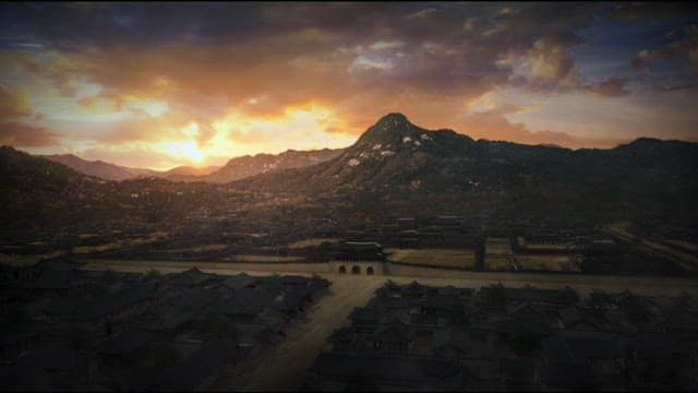 Sunset Reflecting on Old Villages and Mountains