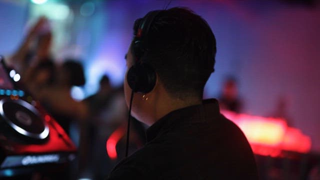 DJ Performing Music in a Club