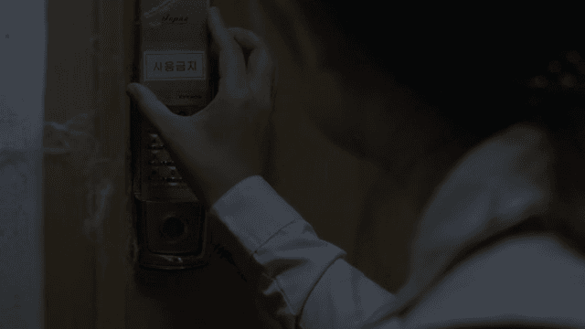 Person checking a locked door lock