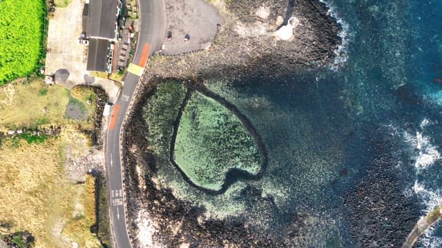 Coastal road and rocky shoreline