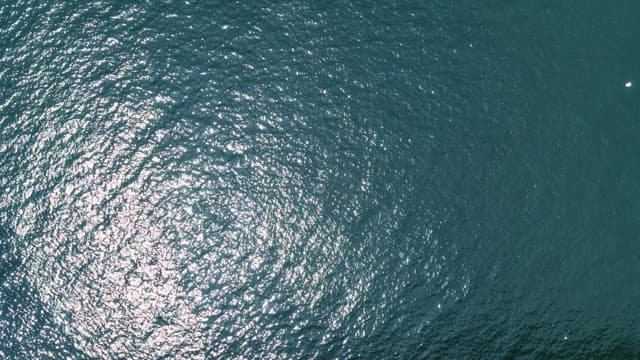 Tranquil Aerial View of Sunlit Ocean