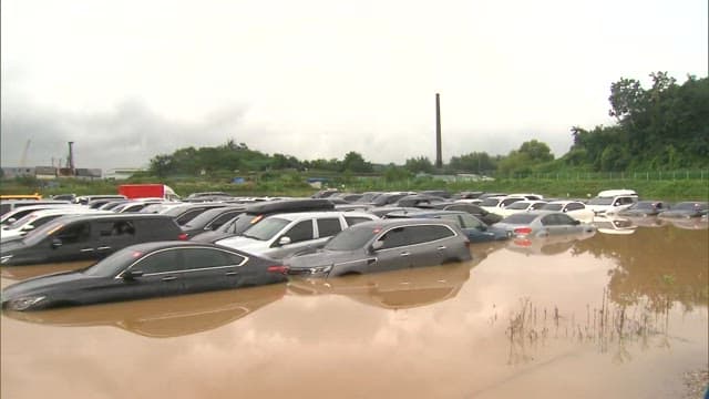 Cars damaged by flood