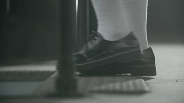 Passenger's Feet Getting Off the Bus